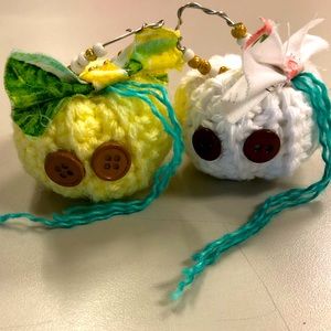 A mini white and yellow pumpkin ornaments